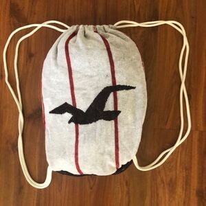 Hollister. Terry cloth, beach towel plus backpack ￼in one.